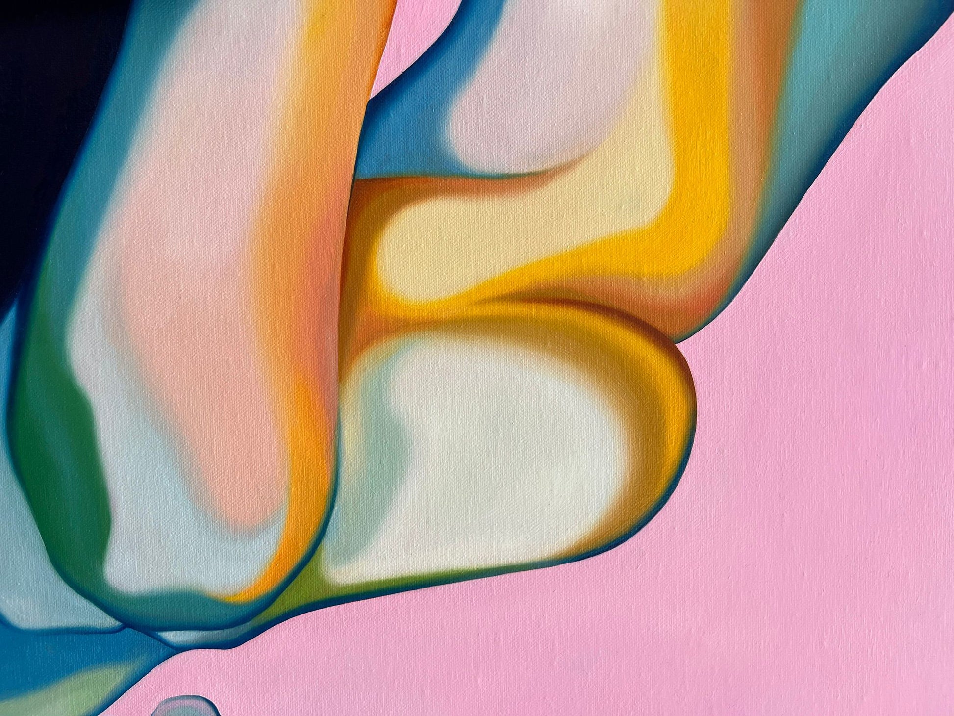 Close up of an original contemporary art piece with colourful figures mirroring each other on a pink background.